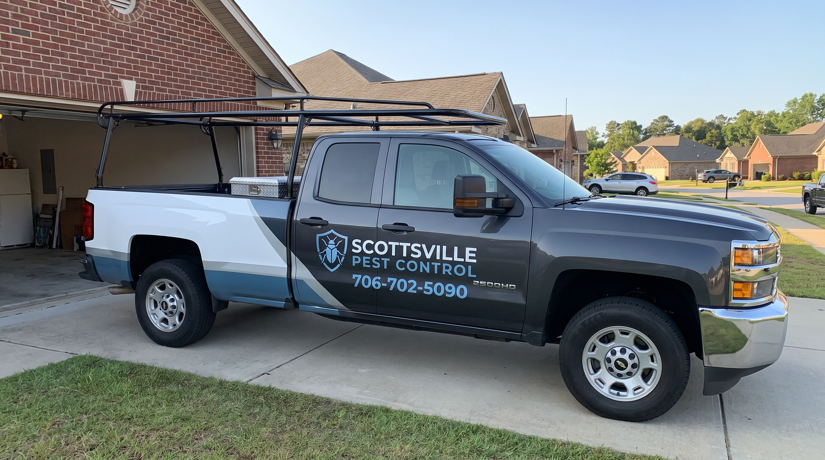 Scottsville Pest Control technician treating a pest problem at an Augusta, GA home